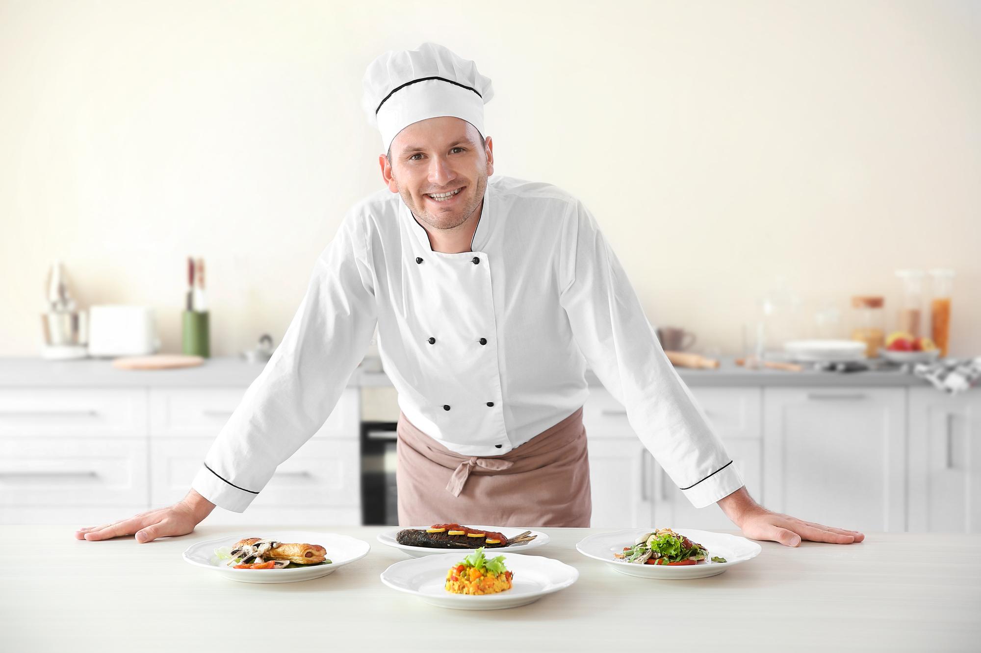 Kitchen studio interior with chef at work